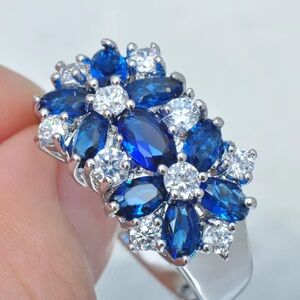 Elegant Blue and Silver Floral Ring